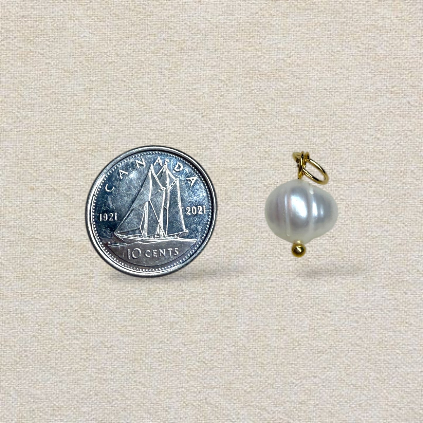 gold pearl charm
