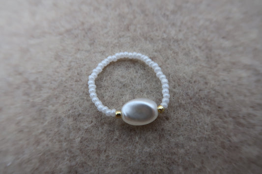 the golden pearl ring
