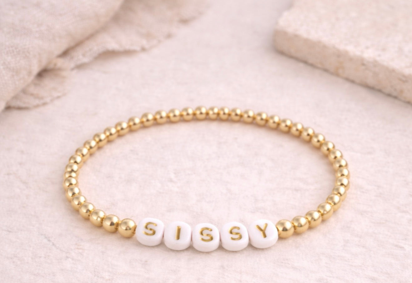 the sissy bracelet in gold