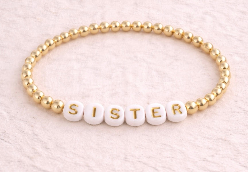 the sister bracelet in gold