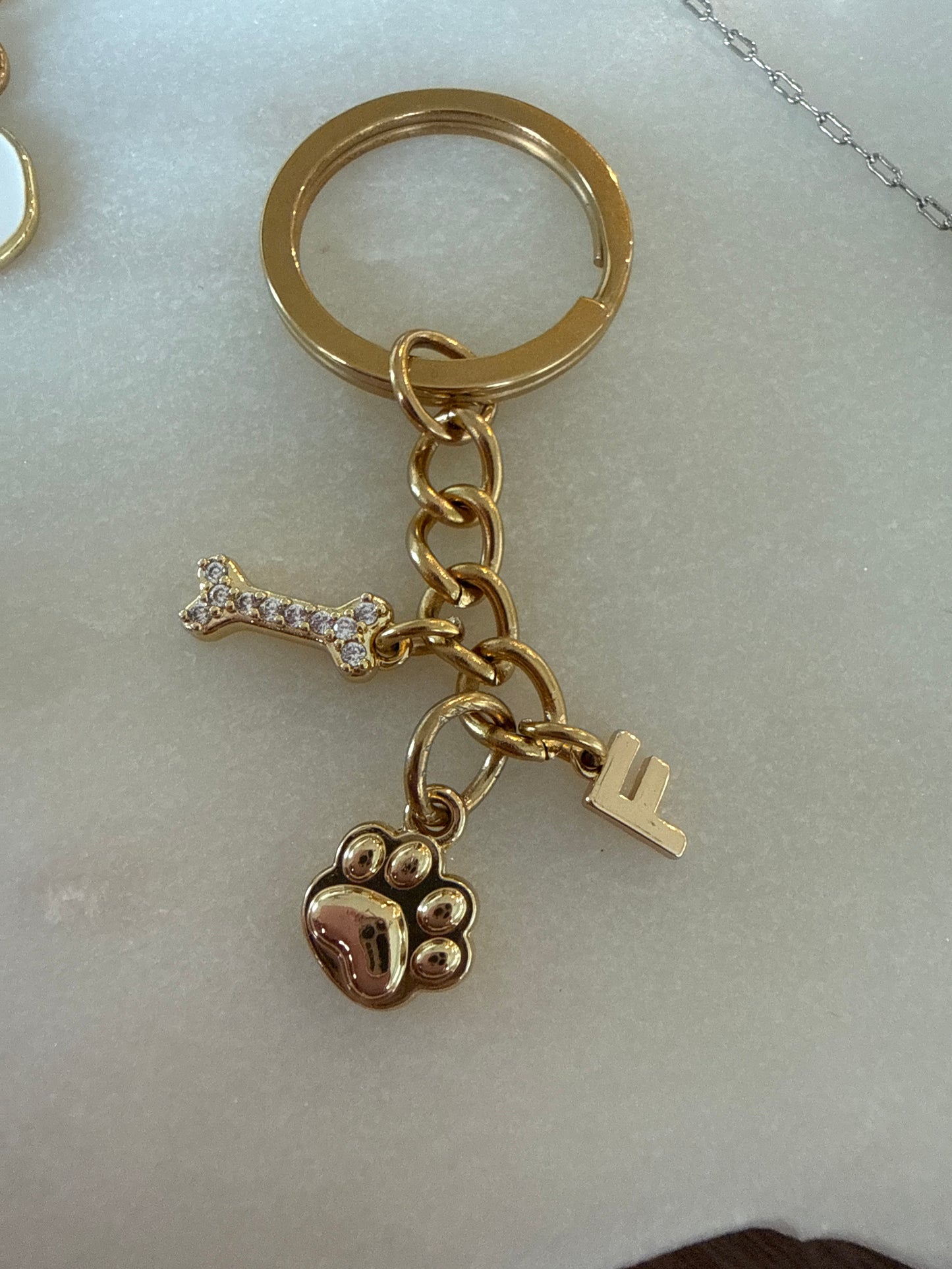 IBC X PAWS keychain gold paw (2)