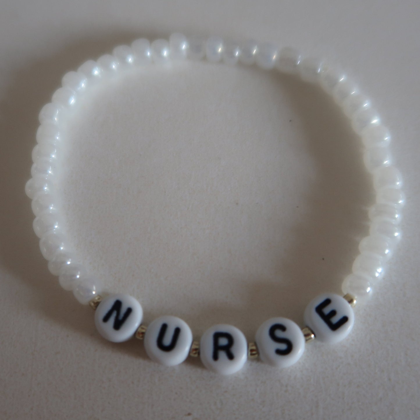 the nurse beaded bracelet in white