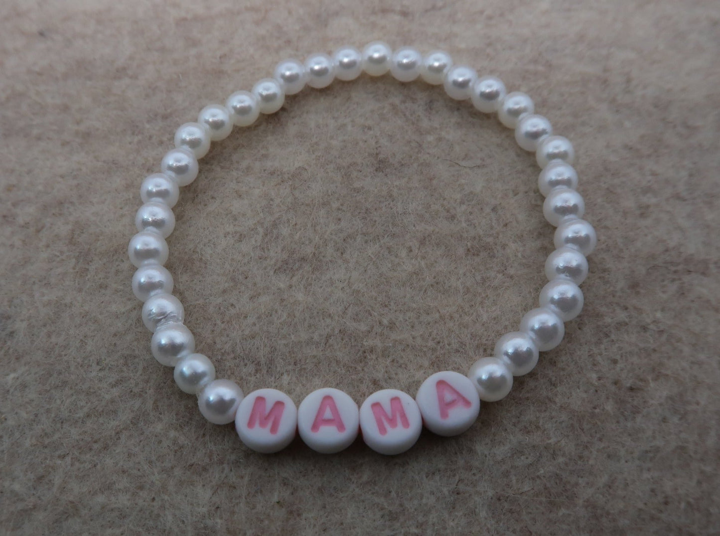 the mama bracelet in pearl and pink