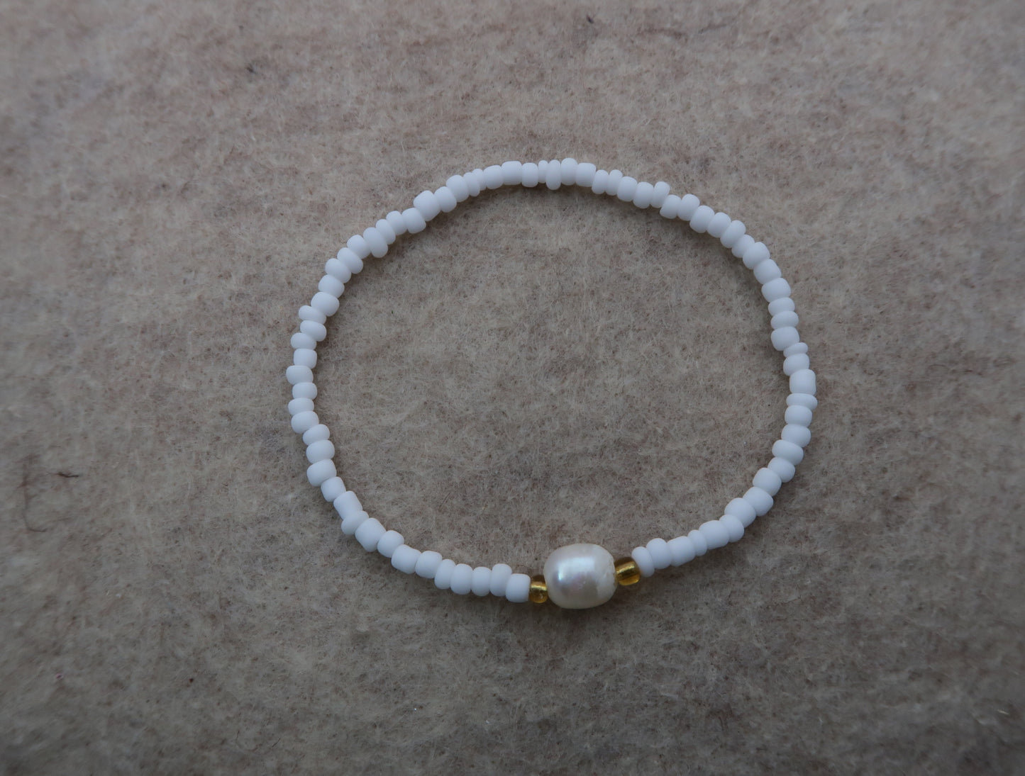 the golden pearl bracelet