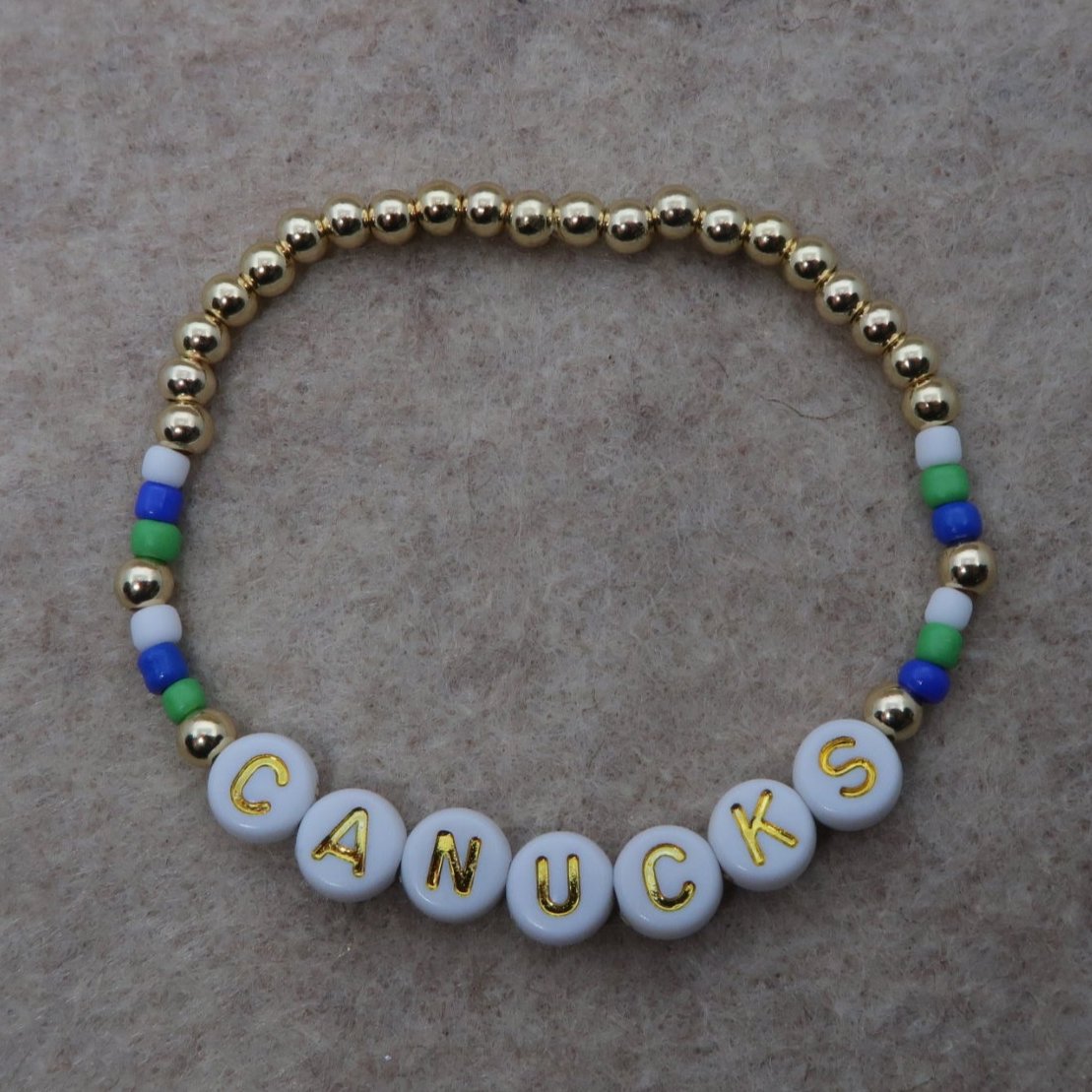 the canucks bracelet in white