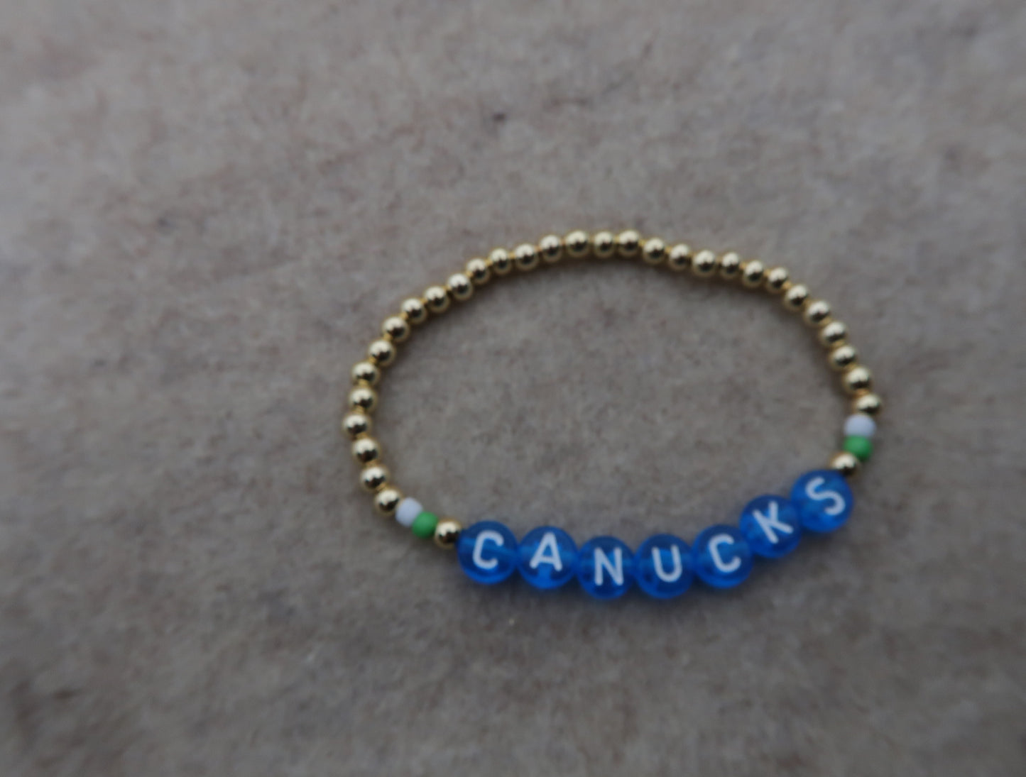 the canucks bracelet in blue