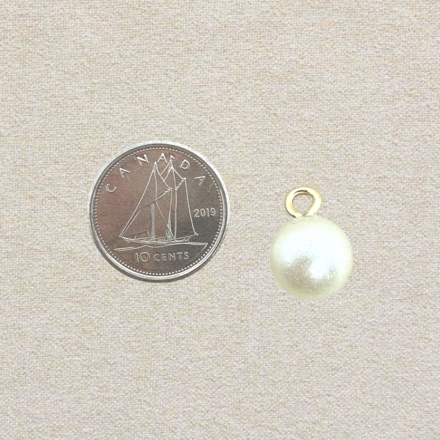 gold pearl charm (big)