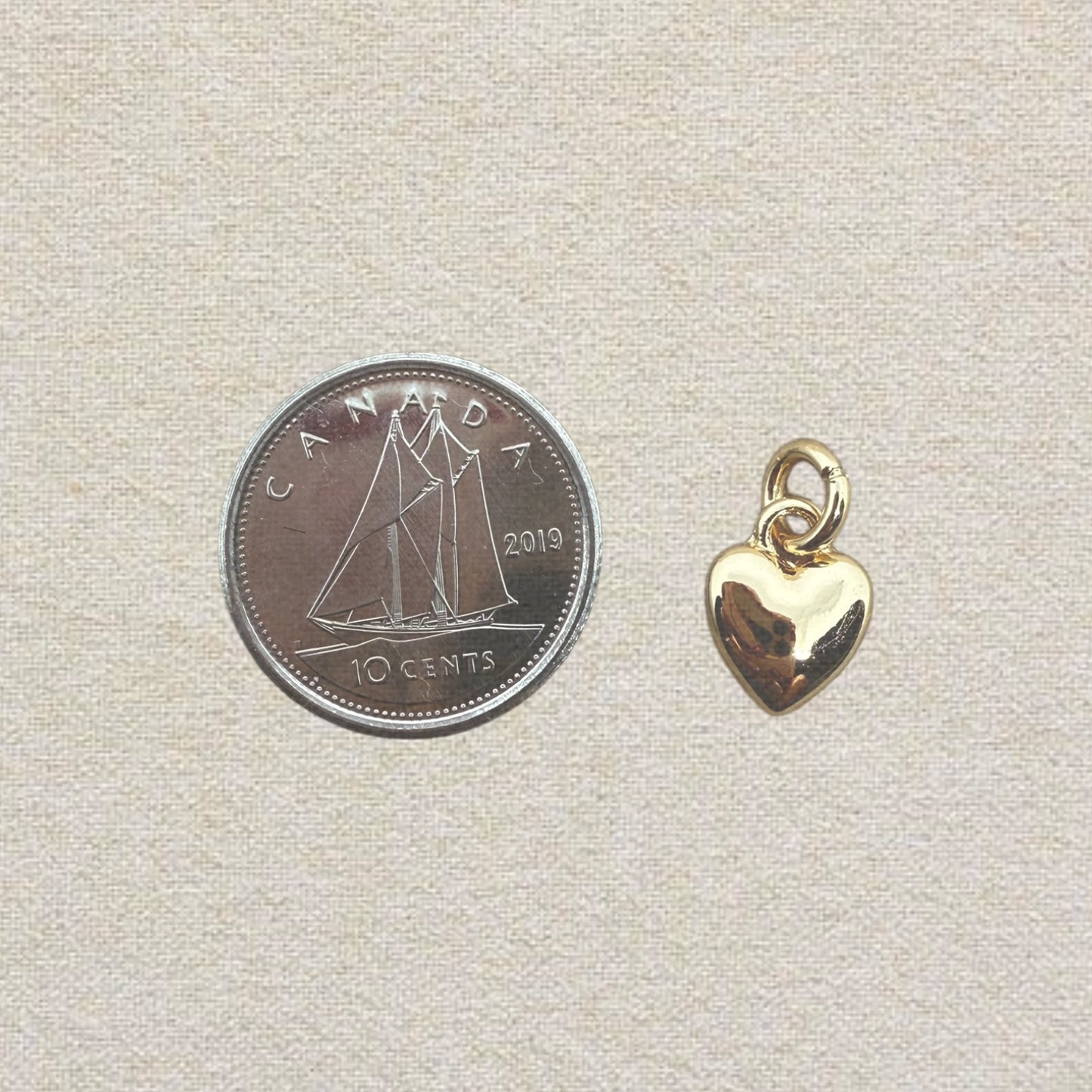 gold puffy heart charm