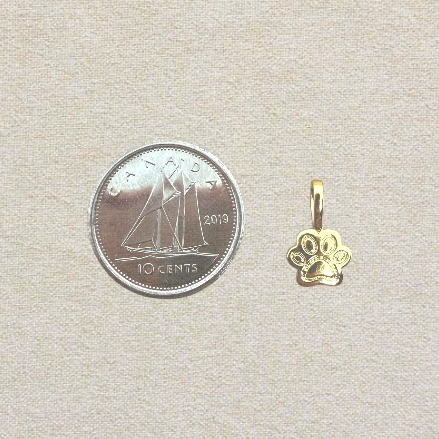 gold mini paw charm