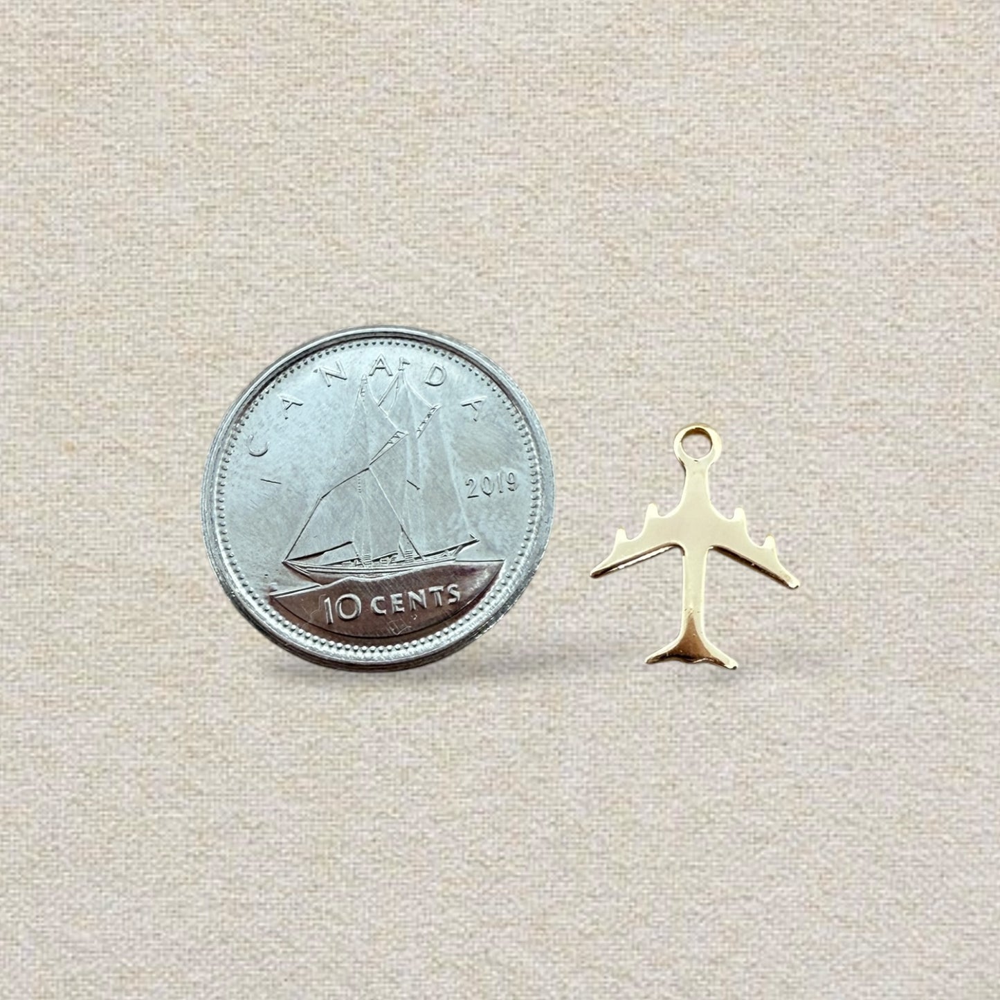 gold airplane charm