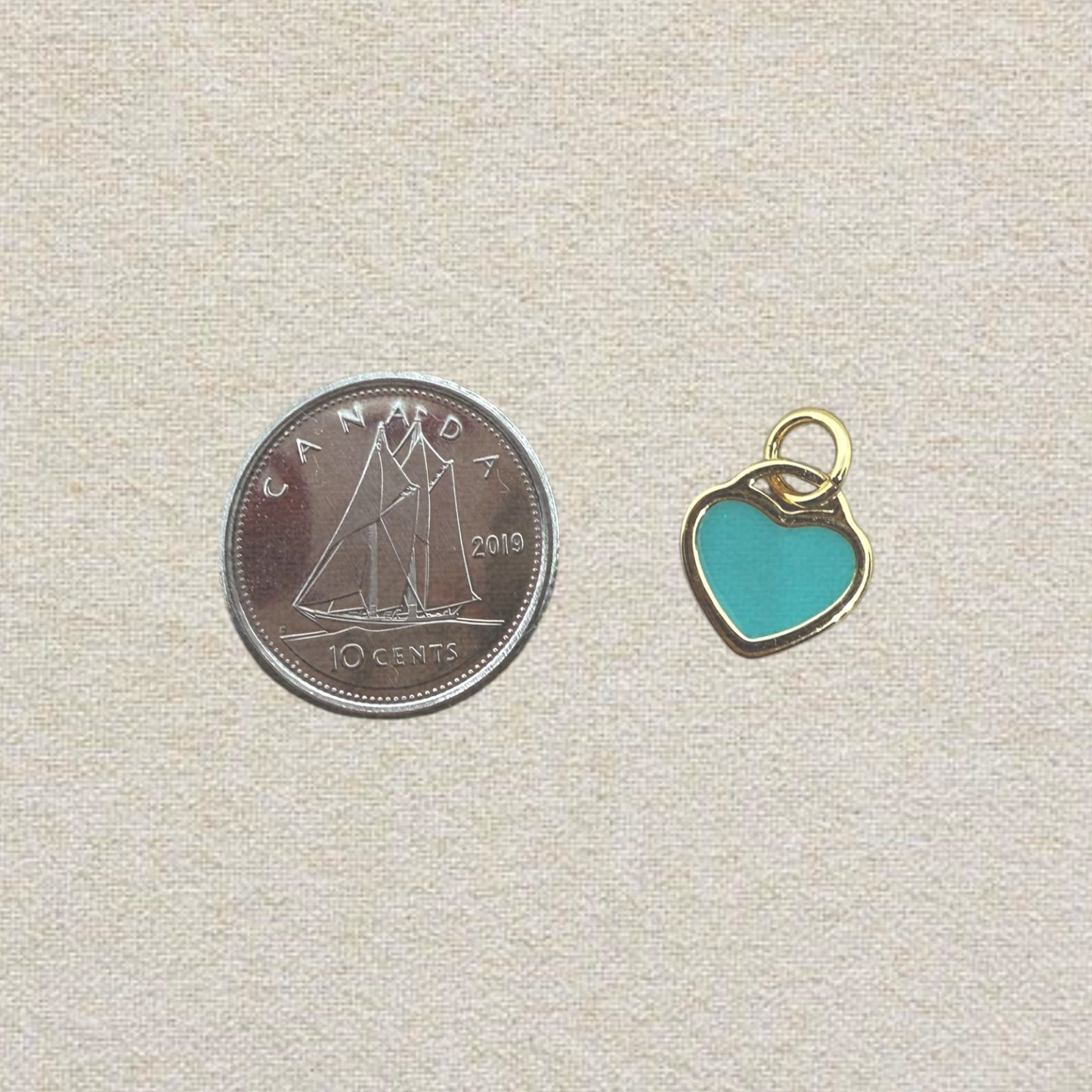 gold and pink heart charm