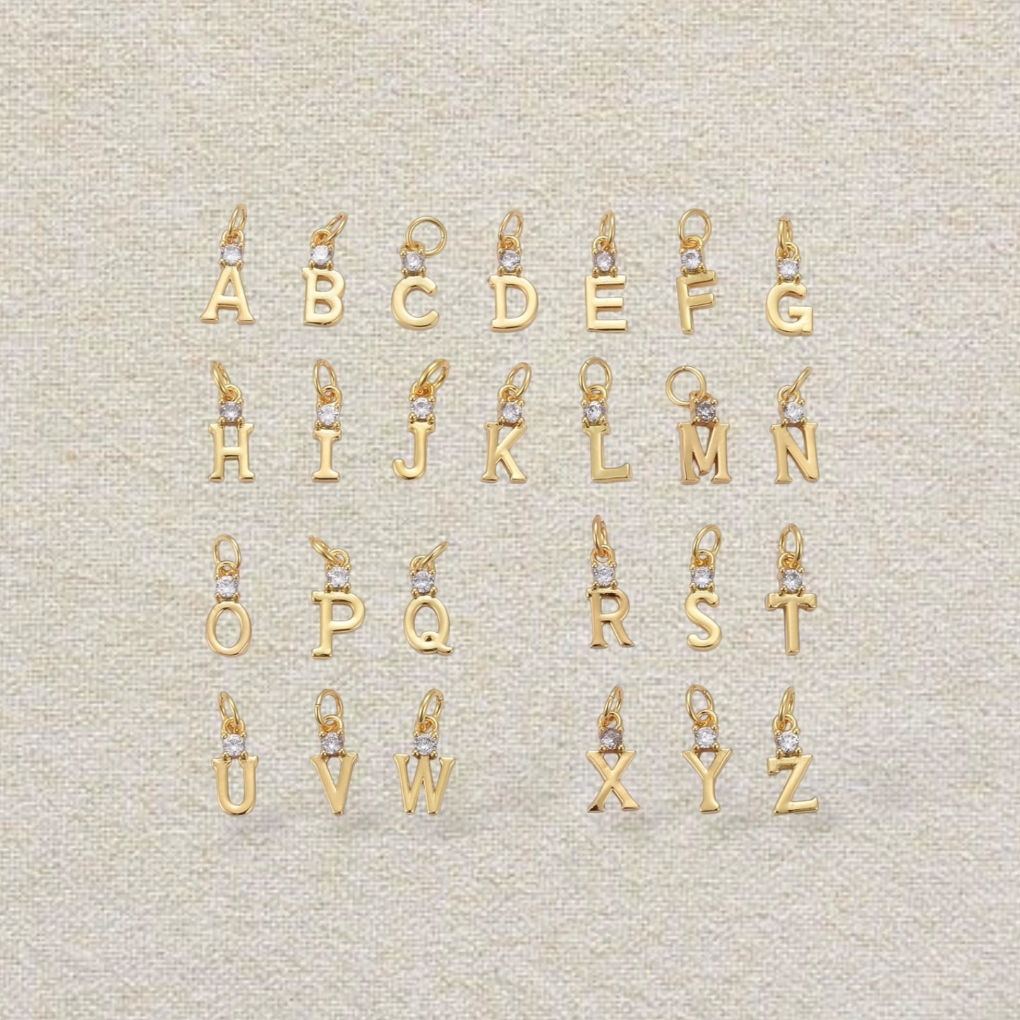 gold letter charm with rhinestone