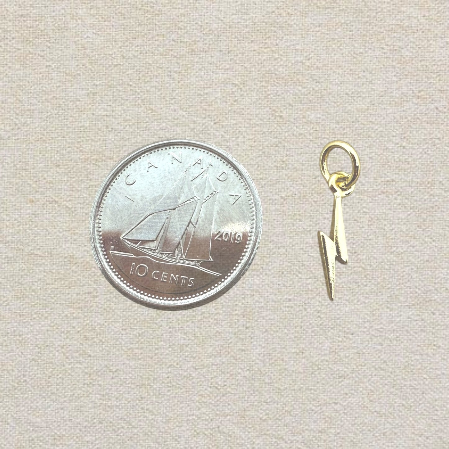 gold mini lightning bolt charm