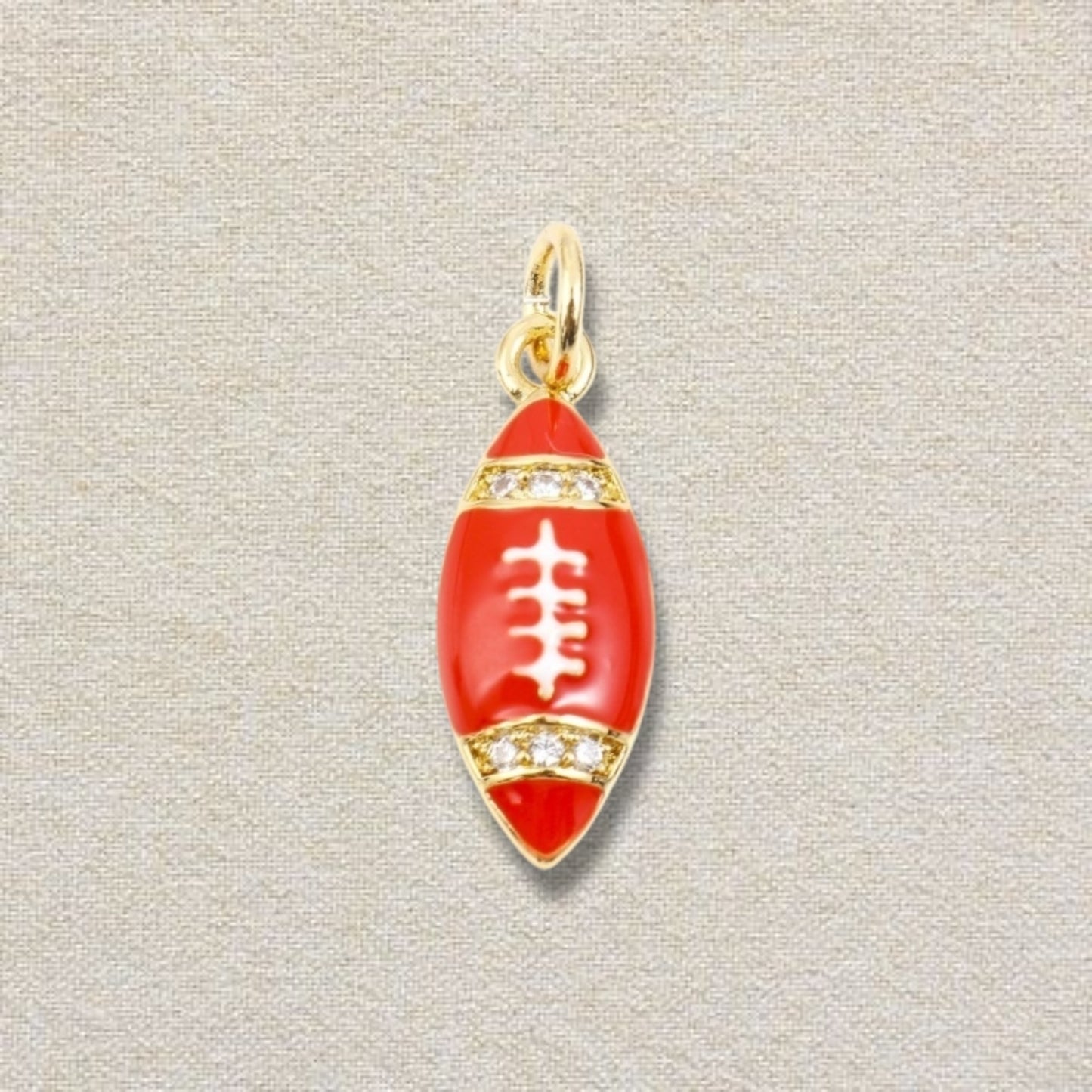 red and gold football charm