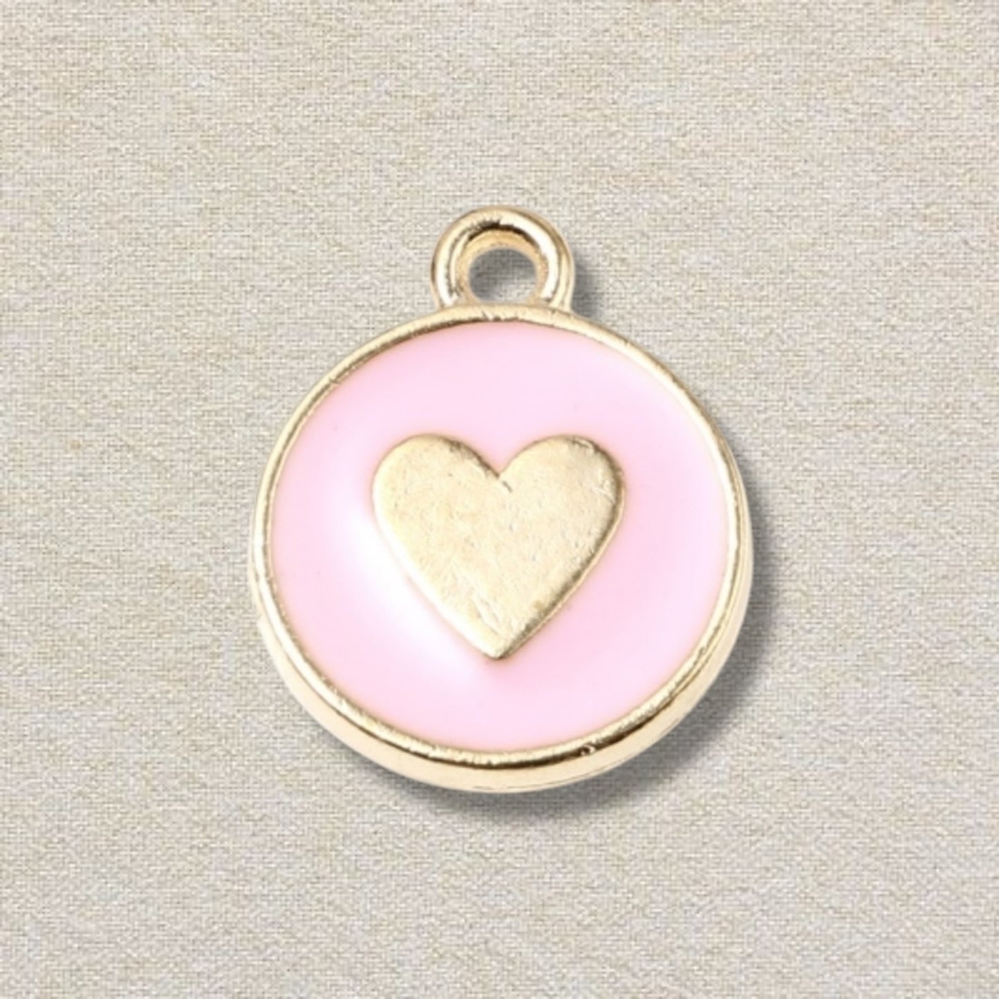 pink and gold heart charm