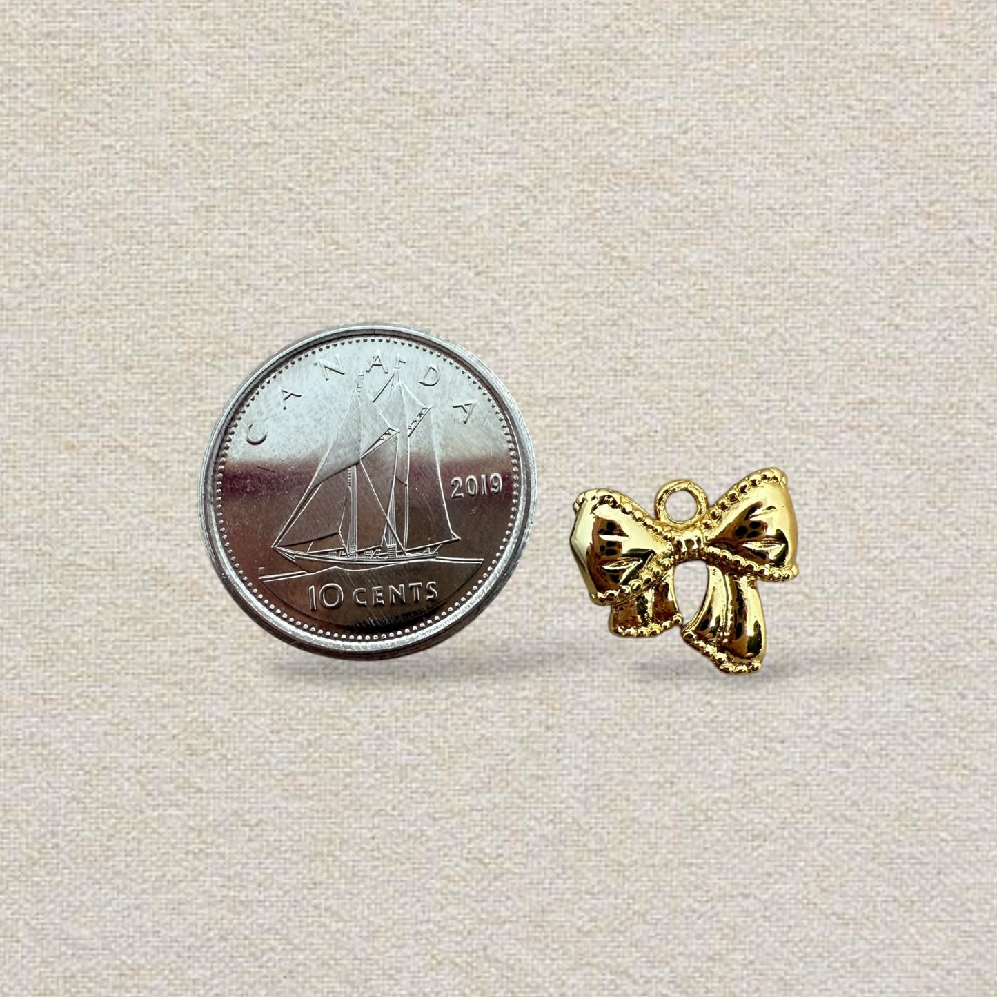 gold bow charm (3)