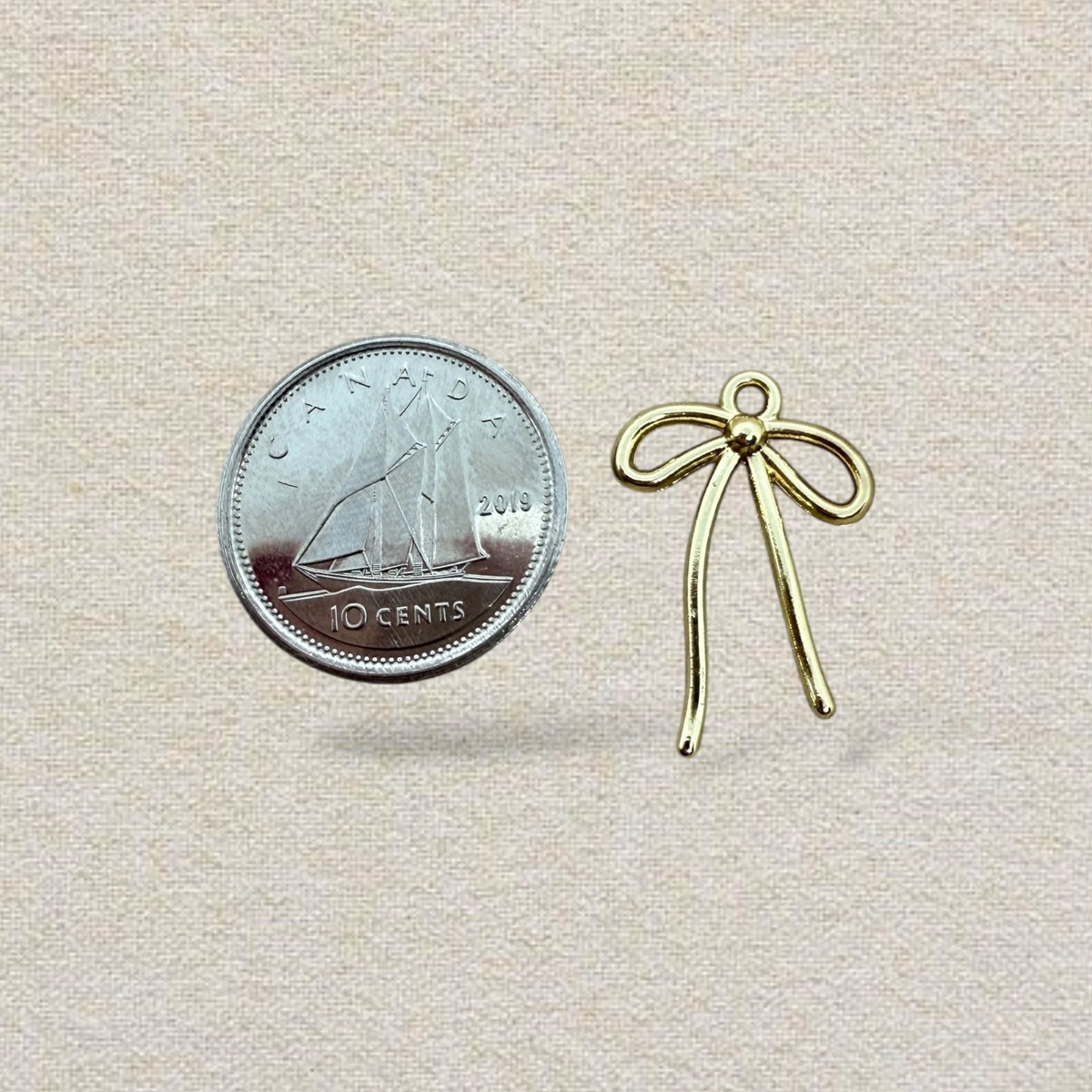 gold bow charm (4)