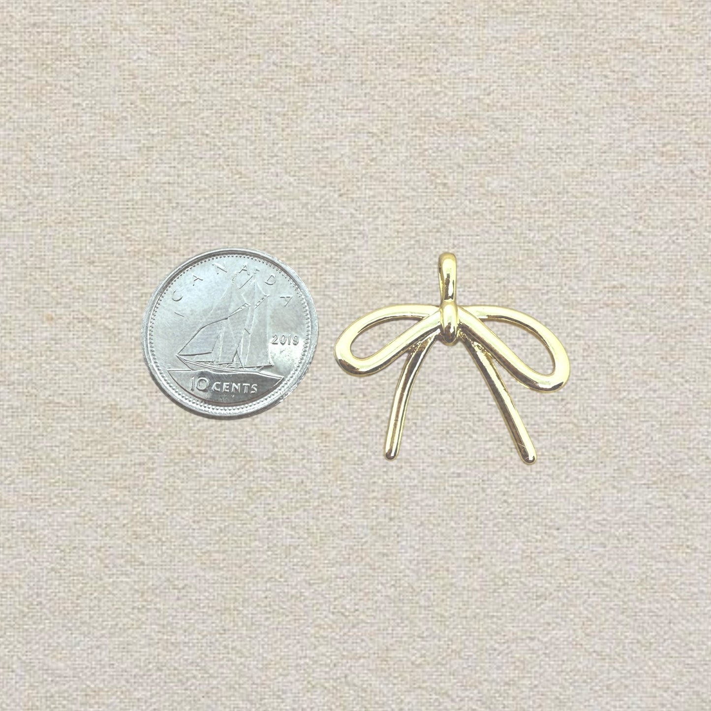 gold bow charm (6)