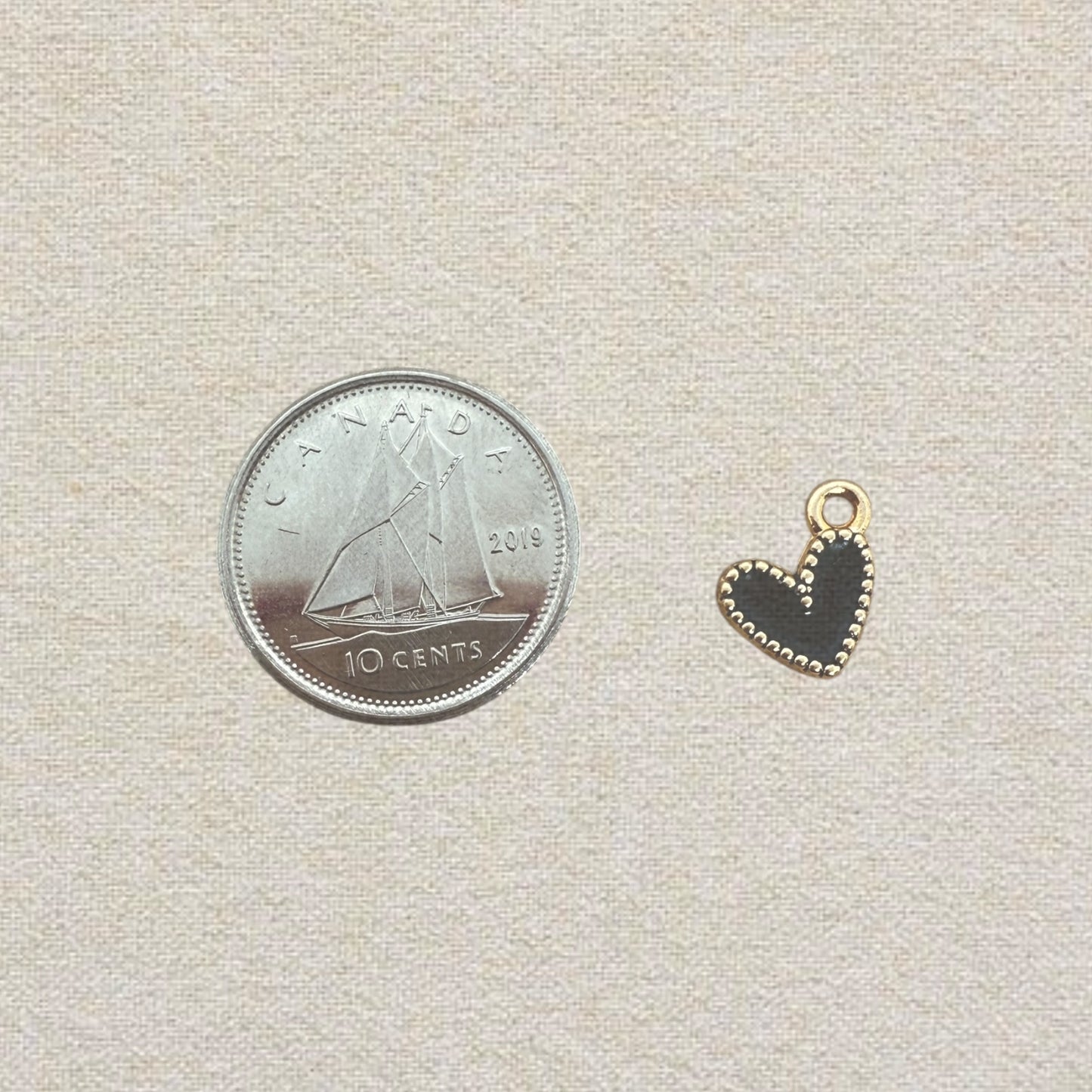 black enamel heart charm
