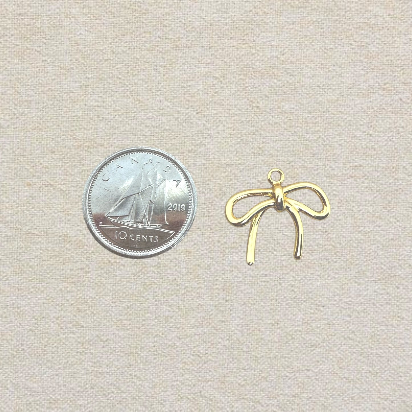 gold bow charm (1)