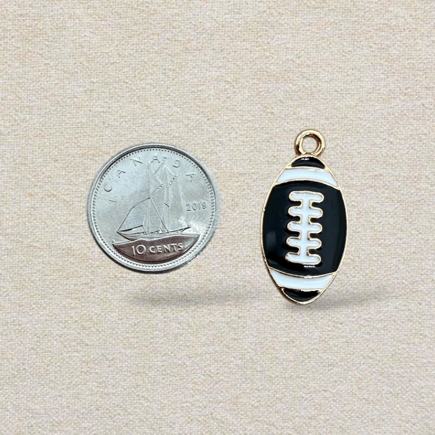 gold and brown rhinestone football charm