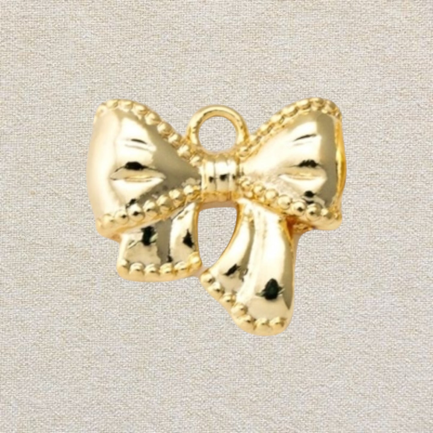 gold bow charm (3)