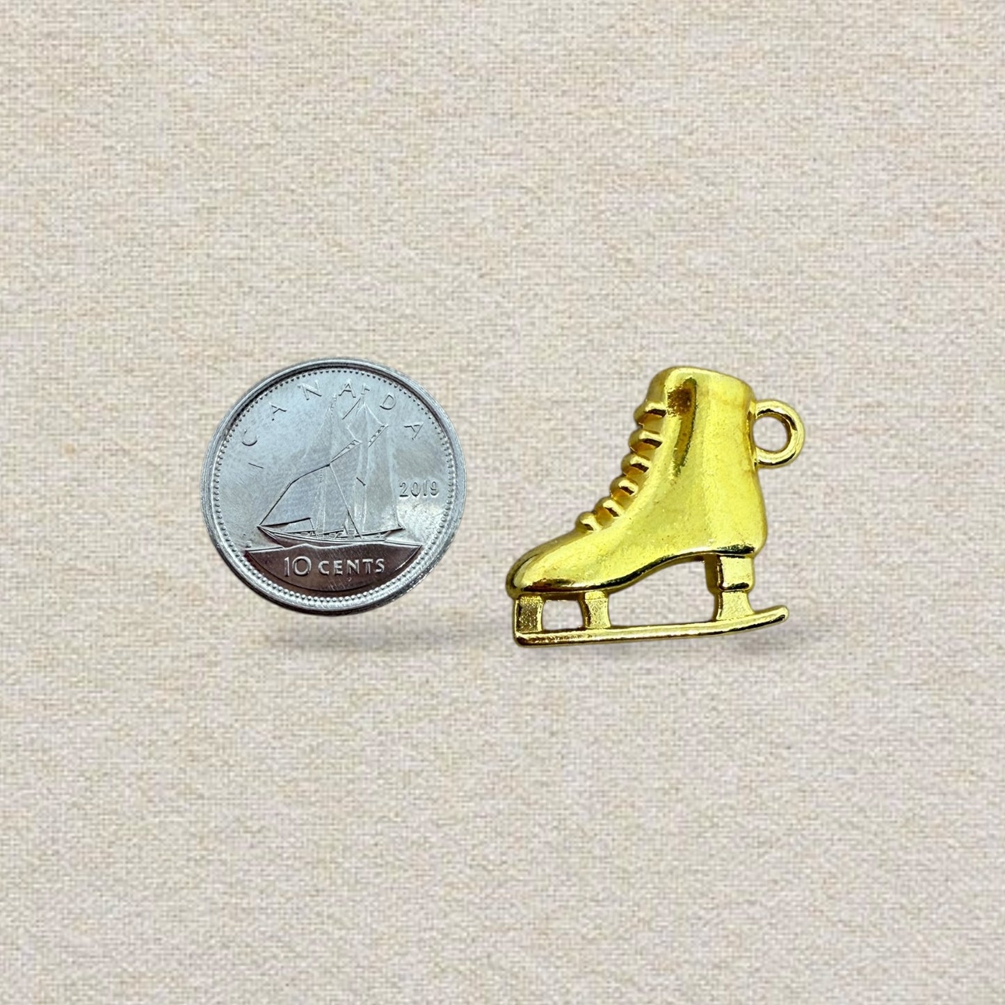 gold ice skate charm