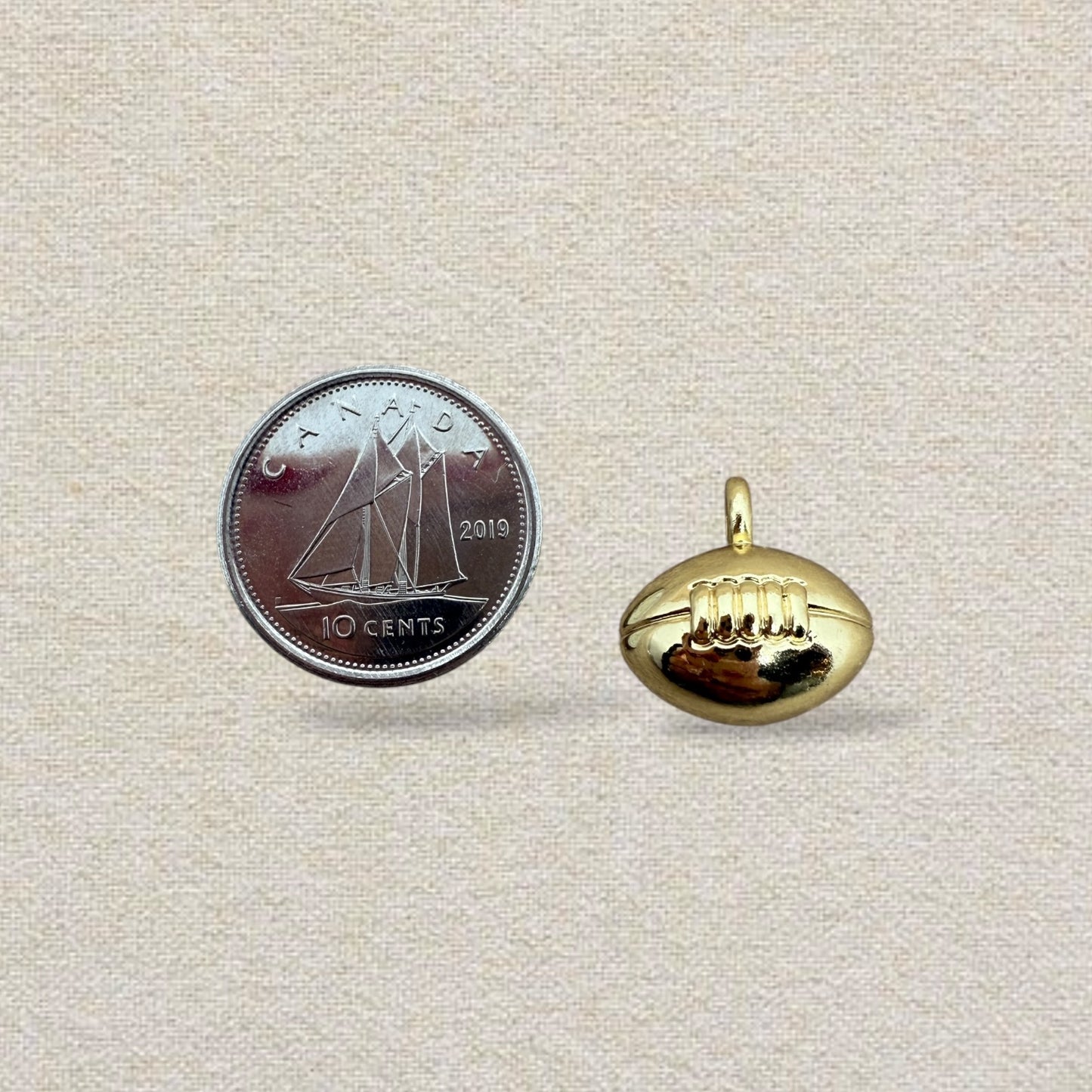 gold football charm