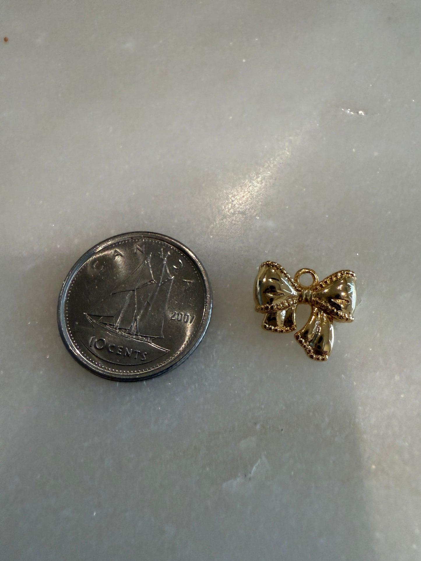 bow charm (gold) (3)