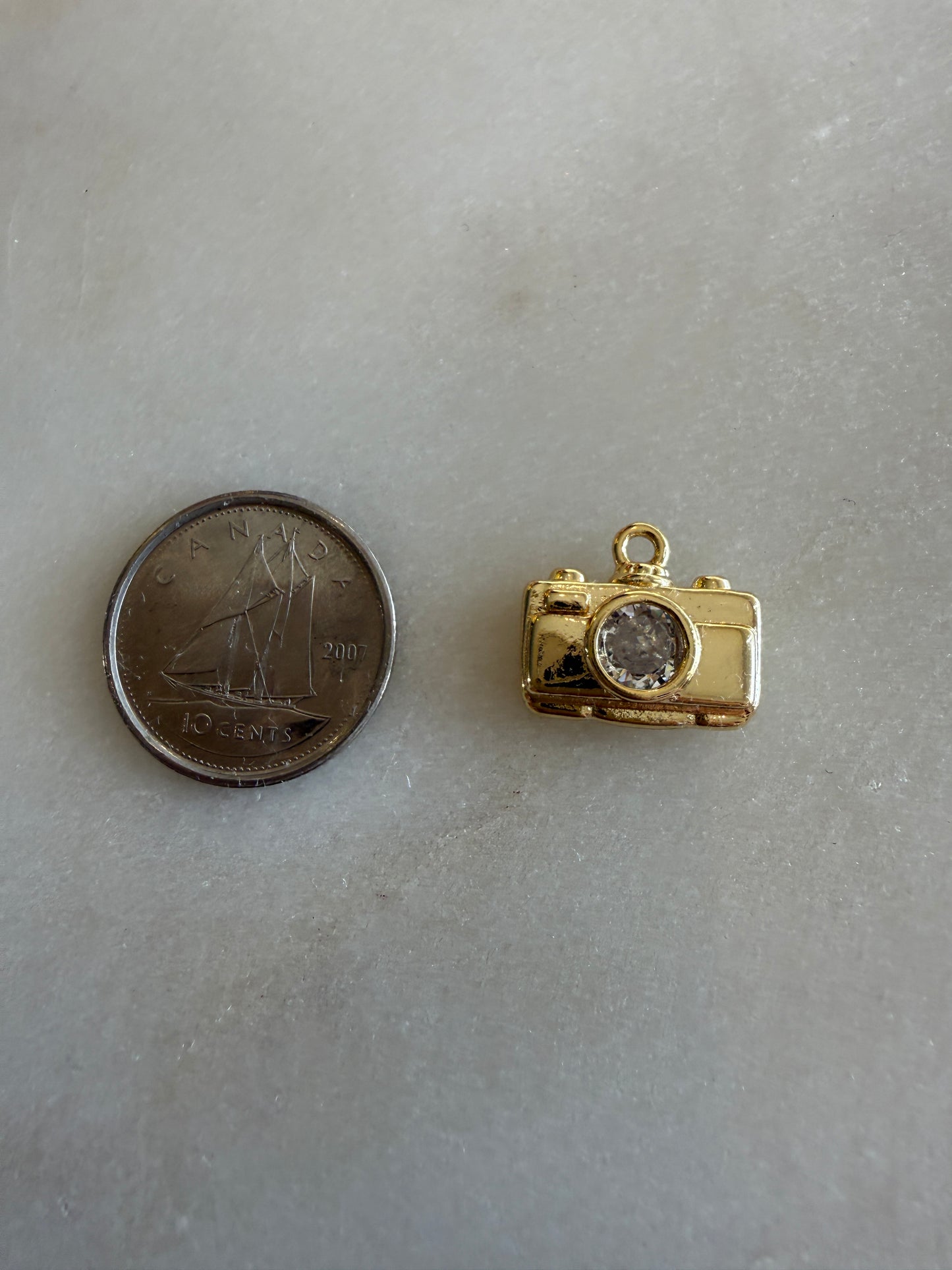gold camera charm