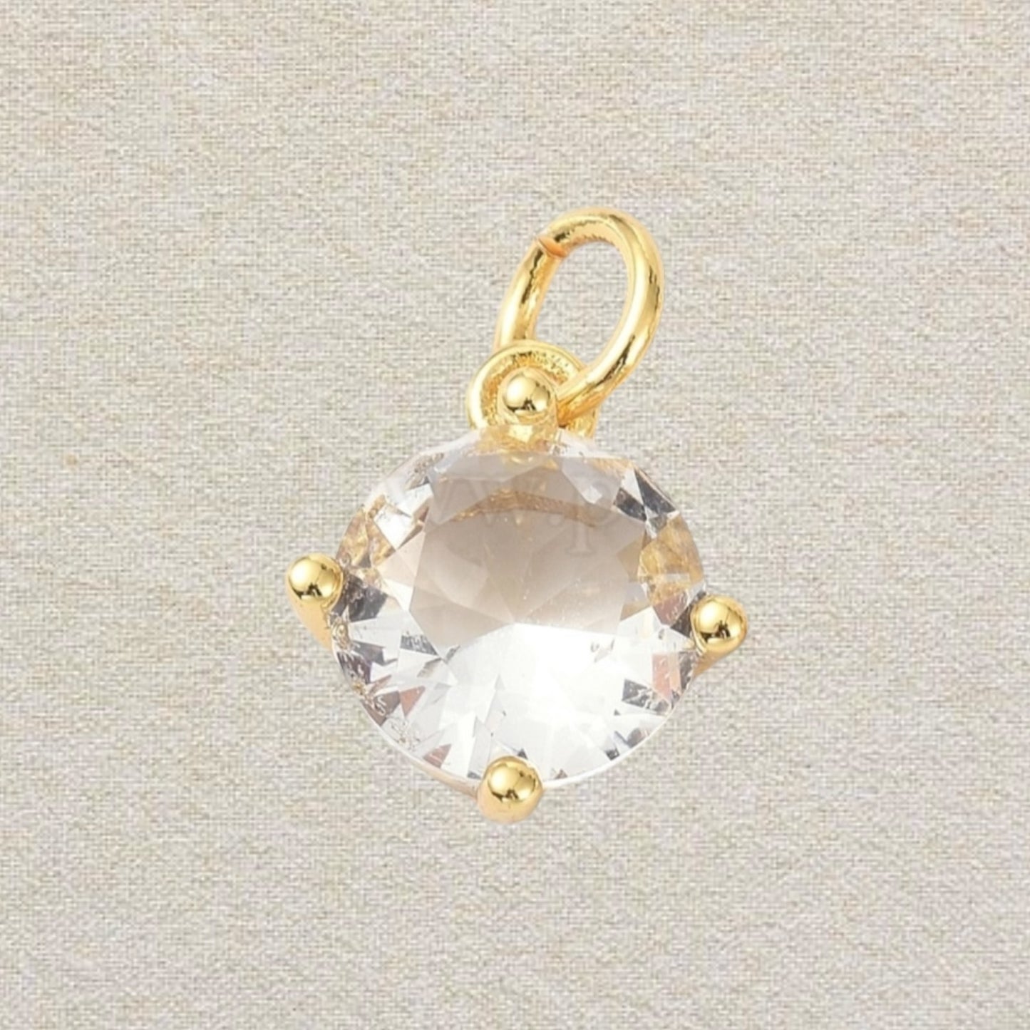 gold round cubic zirconia charm
