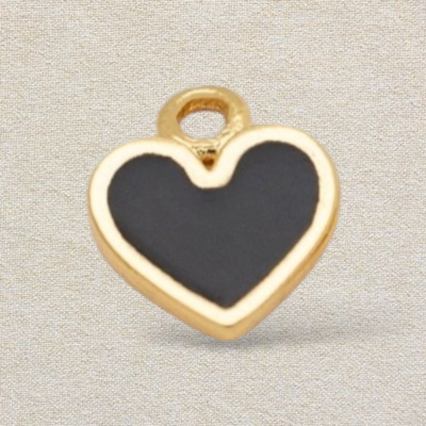 gold and black heart charm