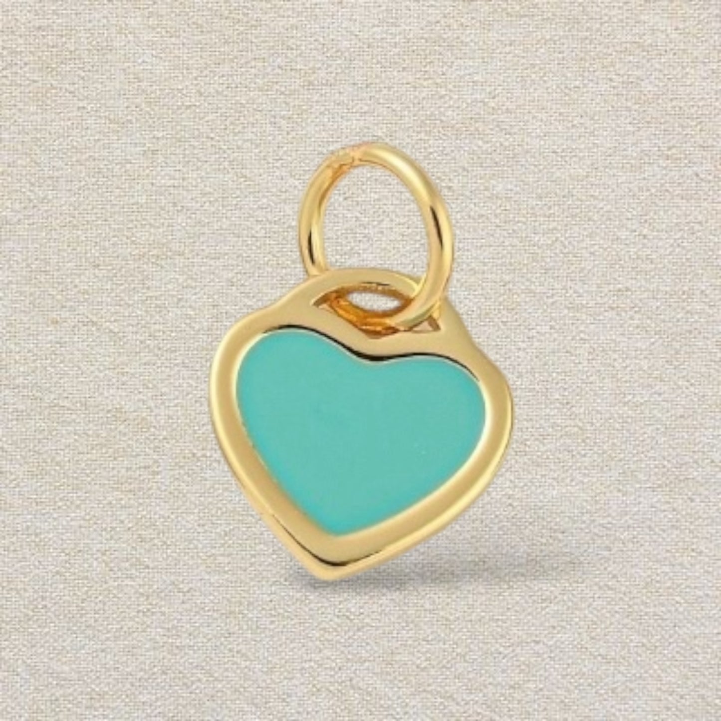 gold tiffany blue heart charm
