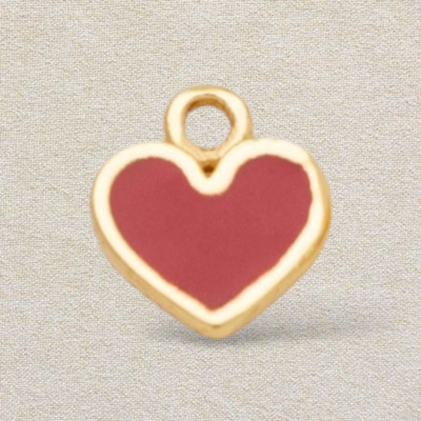 gold and red heart charm
