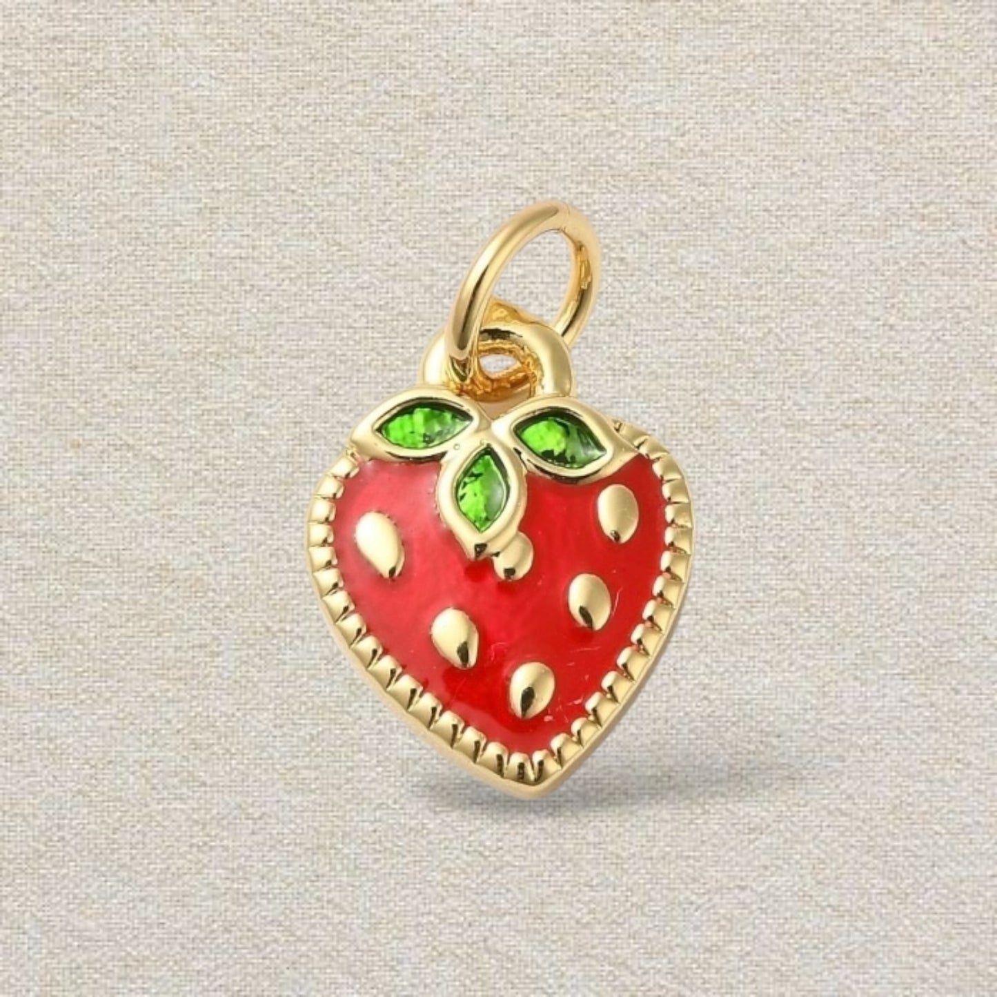 gold and red strawberry charm
