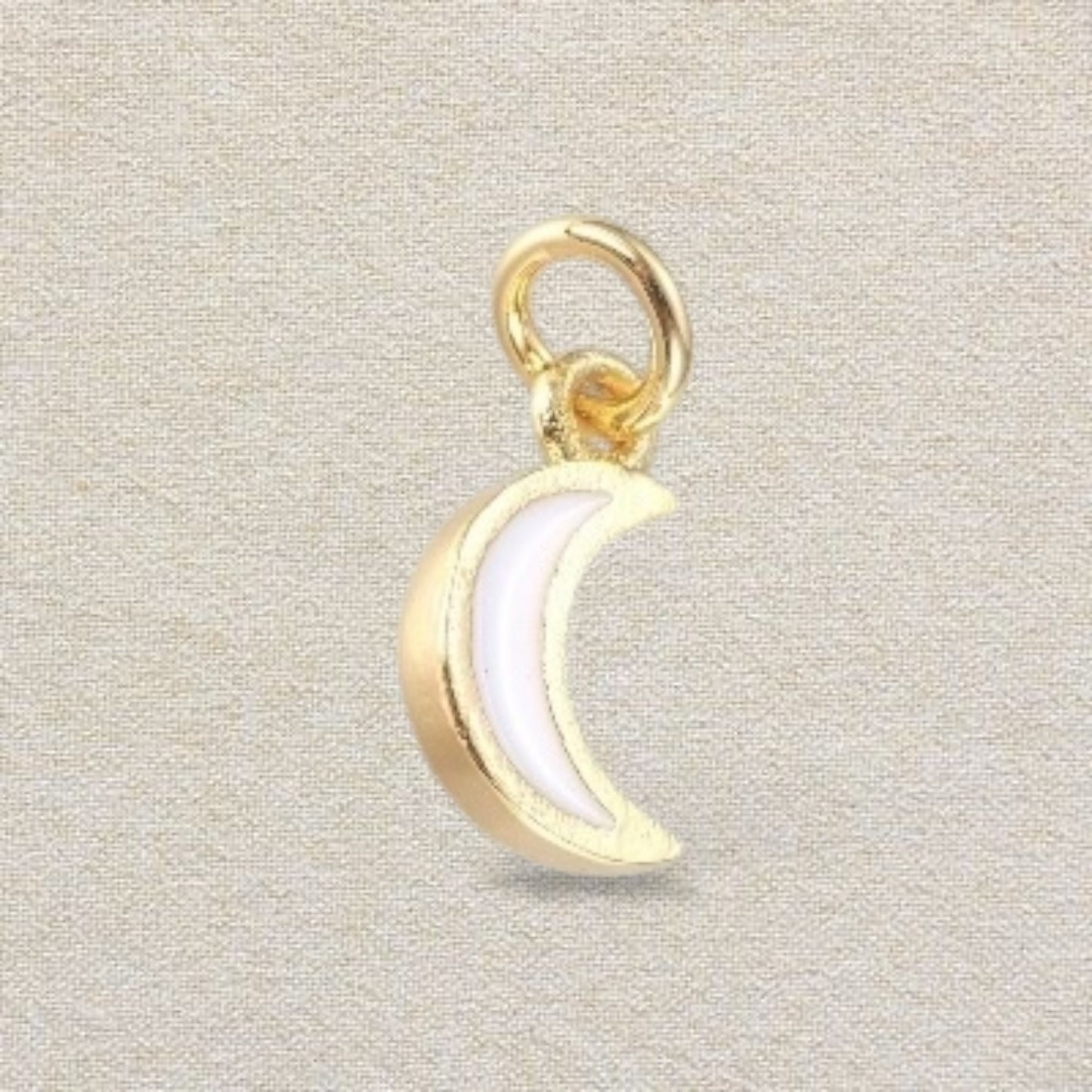 gold and white mini moon charm