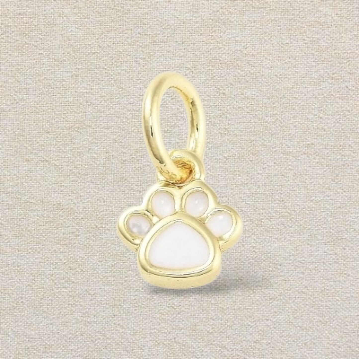gold and white mini paw charm