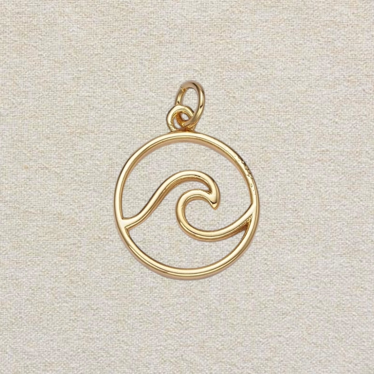 gold wave charm
