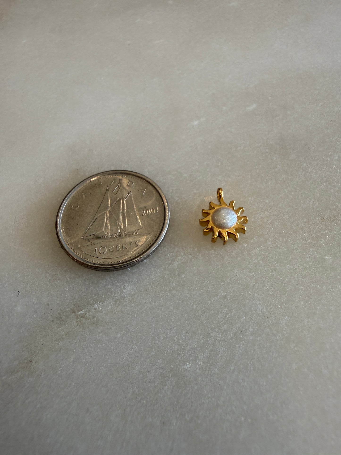 sun charm (gold&white) 2