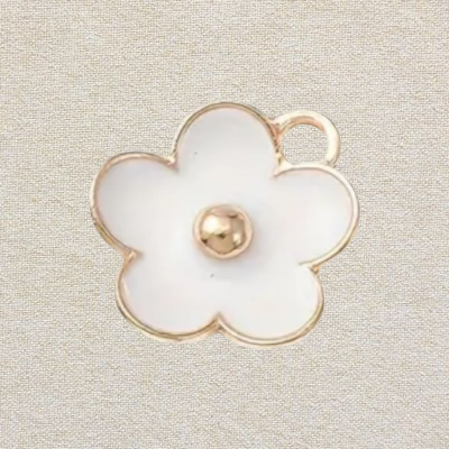 white flower enamel charm
