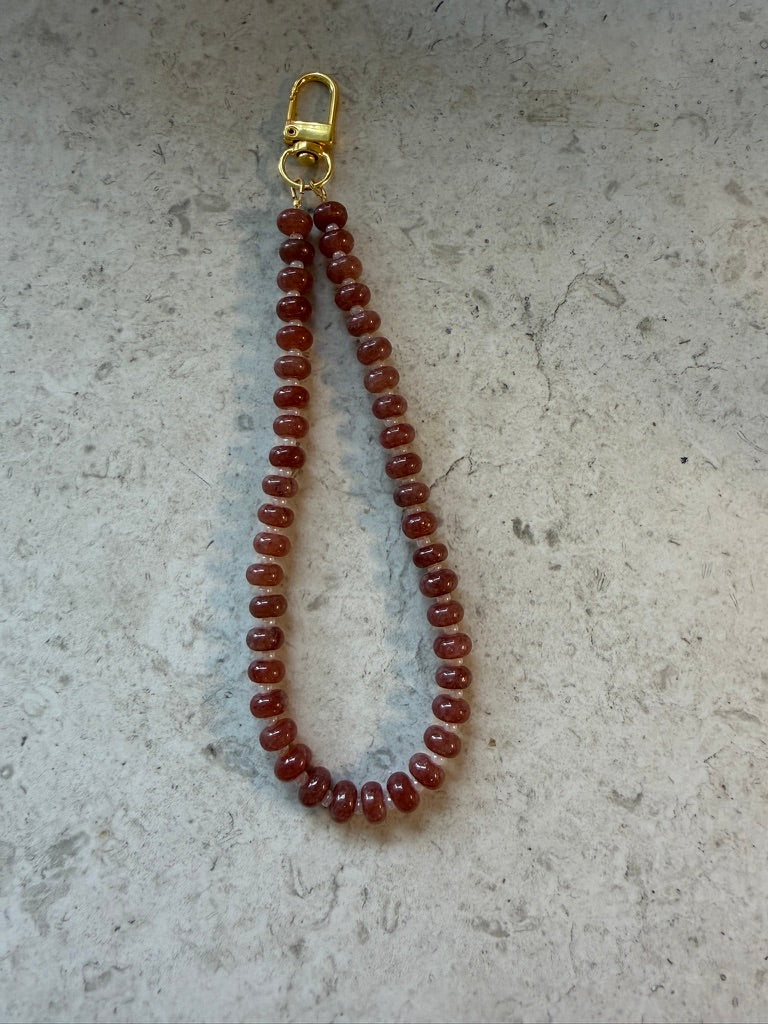 beaded phone charm (rootbeer)