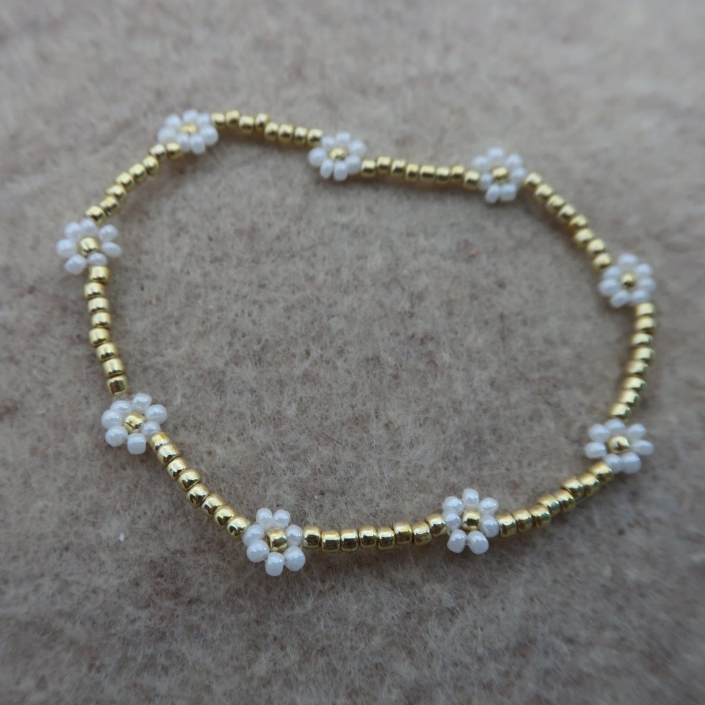 the mini golden daisy bracelet