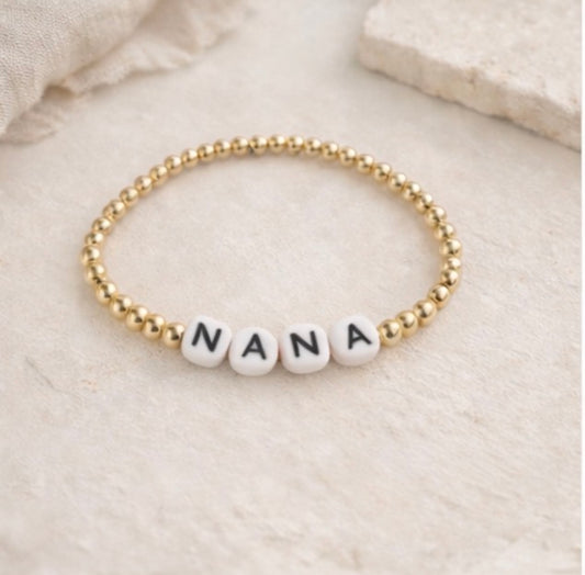 the nana bracelet in gold (white & black)
