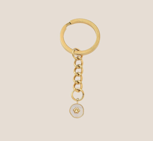 IBC X PAWS white pendant keychain