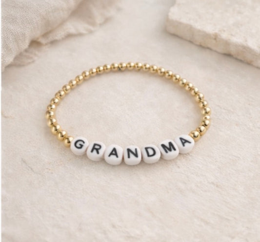 the grandma bracelet in gold (white & black)
