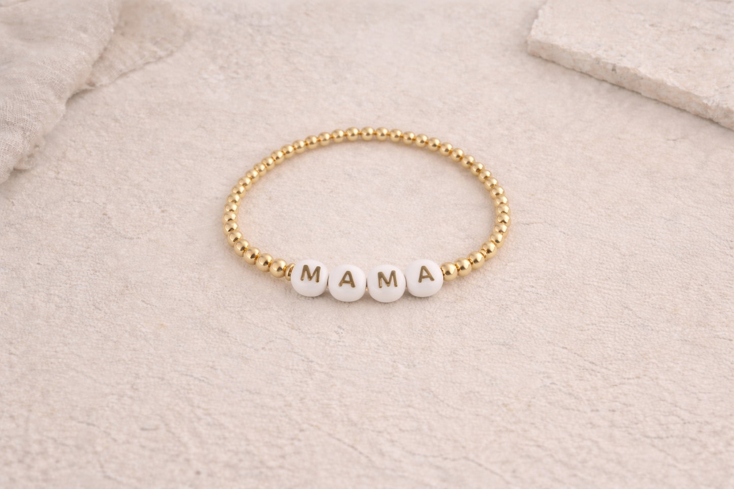 the mama bracelet in gold