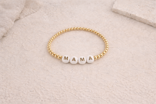 the mama bracelet in gold