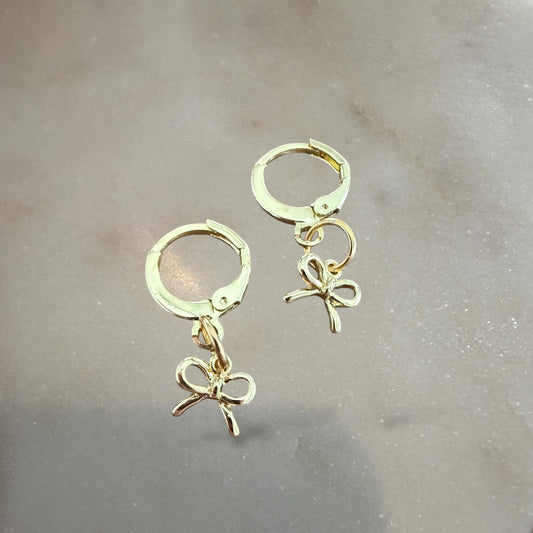 Bow huggie earrings
