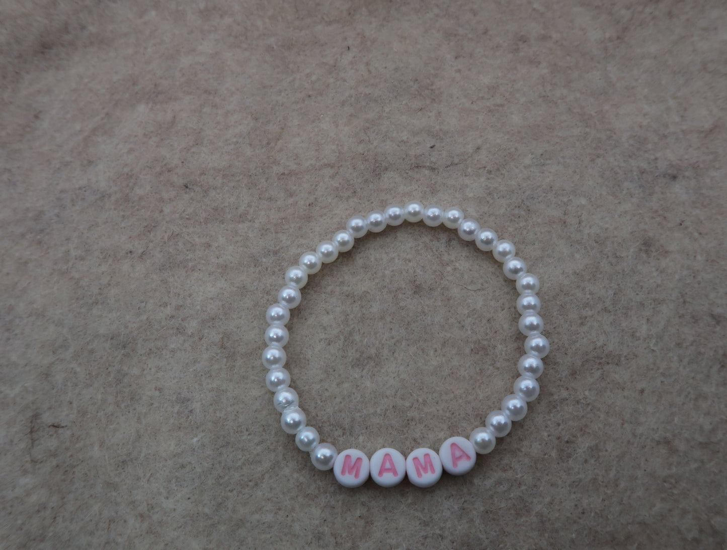 the mama bracelet in pearl and pink