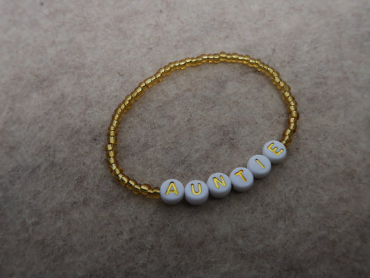 the auntie bracelet in gold